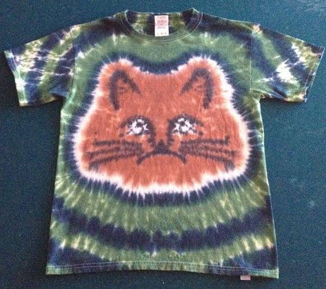 Custom made to order Cat tie dyed shirt. All of our shirts are 100% heavy weight cotton and the colors DO NOT fade! We have over 20 years experience in the tie dye business. We love it just as much today as we did 20 years ago!! We offer a variety of patterns and we take requests for stuff we don't already do. Contact us today and create your own one of a kind tie dye. We also offer wholesale pricing to business customers. Contact us today for wholesale pricing information. Last but not least we Cat Tie Dye, Earthy Tie Dye, Tye Dye Ideas, Tye Dye Clothes, Tie Dye Business, Tie Dye Ideas, Aesthetic Clothes Vintage, Cool Tie Dye Designs, Cool Tie Dye Patterns