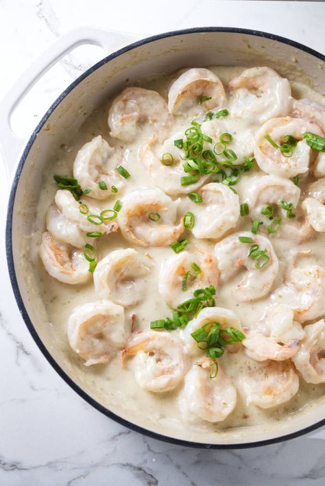 Creamy Coconut Shrimp is a 15-minute dinner that may be made in a Chinese buffet style! For a tangy mix, the soft shrimp is rapidly sautéed in coconut oil, then swirled into the sweet coconut sauce and garnished with fresh lime zest!! Creamy Coconut Shrimp You'll adore this savory but simple shrimp dish if you're like me and like a quick weekday dinner! #dinner #Seafood #Shrimp Creamy Coconut Shrimp Recipe, Chinese Coconut Shrimp Recipe, Chinese Coconut Shrimp, Creamy Coconut Shrimp, Coconut Shrimp Sauce, Coconut Shrimp Recipe, Coconut Shrimp Recipes, Chinese Buffet, Fancy Dinner Recipes