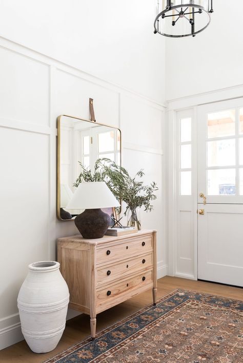 Love this beautiful entryway with a wood cabinet, brass mirror, rug, baskets and neutral decor - entryway ideas - foyer - entryway furniture - entryway decor - farmhouse interior ideas Mcgee And Co Hallway, Mcgee Foyer, Mcgee And Co Entryway, Mcgee And Co Bathroom, Transitional Entryway Decor, Studio Mcgee Entryway, Mcgee Entryway, Entry Table With Mirror, Entryway Inspiration