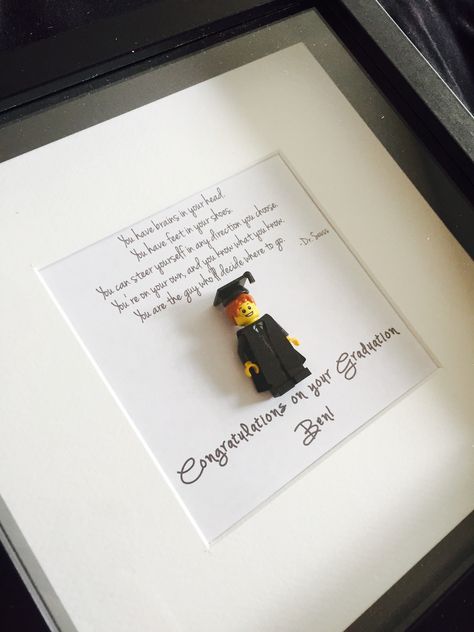 Do you know someone who's graduating this summer? Why not buy them a gift that's a little different? Graduation Lego Minifigure Shadowbox Frames come in a choice of white or black frame, male or female graduate with cap and gown and a variety of hair options. £30 +P&P Graduation Momento Ideas, Presents For Graduation, Graduation Boyfriend Gifts, Graduation Gift Boyfriend, Graduation Gift Ideas For Brother, Graduation Box Gift Ideas, Graduation Presents For Boyfriend, Graduation Gift Box Ideas, Lego Graduation