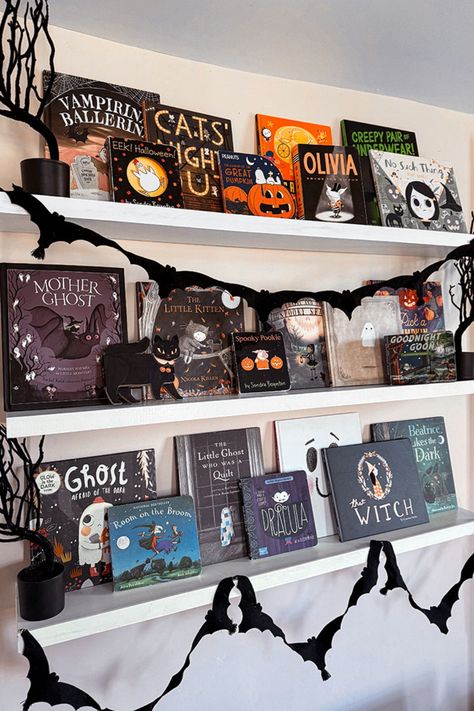 Transform your child's reading nook into a spine-chilling Halloween haven! Discover how to style your kid's bookshelf with enchanting (and aesthetic) Halloween books, whimsical bat garlands, and gnarled trees that will spark the imagination. Don't miss out on tips and tricks for Halloween bookshelf decor for kids—head over to the blog now and elevate your decor game! Halloween Decorations Bookshelf, Halloween Bookshelf Decor, Tricks For Halloween, Halloween Bookshelf, Halloween Picture Books, Halloween Books For Kids, Room On The Broom, Scream Halloween, Sandra Boynton