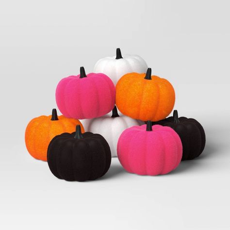 Gear up for Halloween entertaining with this 8-Piece Flocked Pumpkins Halloween Decorative Accent Set from Hyde & EEK! Boutique™. Made of foam, these decorative pumpkins feature solid hues, including black, white, orange and pink to bring a pop of color to your festive decor. Compact in size, they're great for displaying in a basket or with other faux pumpkins or sculptures to create a sweet Halloween centerpiece. Hyde & EEK! Boutique™: Thrilling delights. Curious oddities. Diy Seasonal Decor, Decorative Pumpkins, Halloween Entertaining, Halloween Pumpkins Painted, Modern Halloween, Halloween Centerpiece, Faux Pumpkins, Felt Halloween, Pink Pumpkins