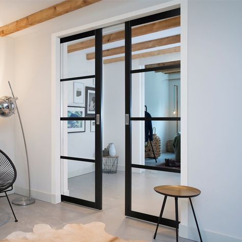 Beautiful Industrial style bespoke pocket doors with a steel look but with the warmth of wood, perfect for a loft or warehouse conversion. #industrialstyle #pocketdoors #bespokedoors Room Dividing, Double Pocket Door, Victorian School, Sliding Doors Internal, Crittal Doors, Double Pocket Doors, Glass Pocket Doors, Internal Glass Doors, Internal Sliding Doors