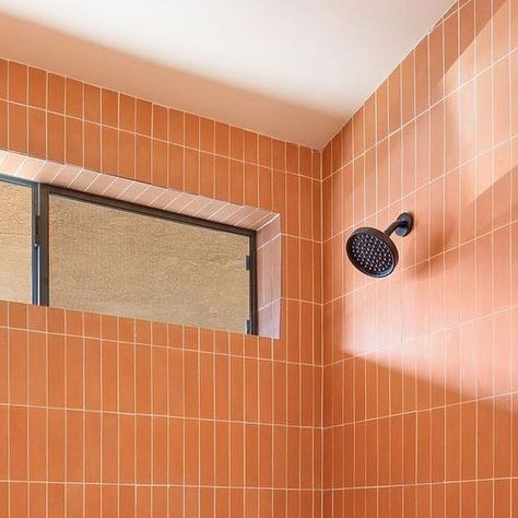 Zia Tile on Instagram: "Modern lines meet mid-century tones in this glorious terra cotta 2x8 shower by designer @grencroy.

📸 by @austnmoreno" Terra Cotta Tile Bathroom, Terracotta Tiles Bathroom, Terra Cotta Tile, Zia Tile, Downstairs Bathroom, Terracotta Tiles, Kids' Bathroom, Terra Cotta, Tile Bathroom