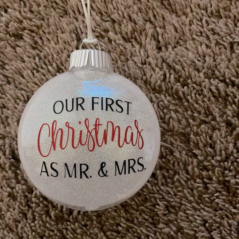 Brand New, Handmade And Customized- 3 Inch Plastic Round Disc Ornament With White Glitter On Inside And Black/Red Vinyl “Our First Christmas As Mr. And Mrs.” Text On Outside! Questions? Just Ask! Round Ornament Svg, Vinyl Christmas Ornaments Cricut, Vinyl Projects Christmas, Christmas Cricut Ornaments, Christmas Ornaments Diy Cricut, Christmas Ornaments Cricut, Popular Ornaments, Cricut Christmas Ornaments, Ornaments Vinyl