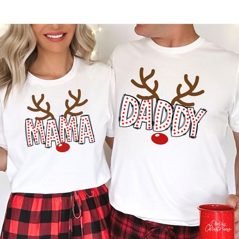 **Note your items will be printed on white or black t-shirt. Capture those picture-perfect Family Matching moments with our Christmas Family Shirts! These match family shirts are designed to make your Christmas Morning photos unforgettable. With a family shirt match like this, you'll have an adorable  look that's both fun and festive for your Christmas Season Family outtings. WHY YOU"LL LOVE IT: This classic unisex jersey short sleeve tee fits like a well-loved favorite, ensuring comfort and sty Family Christmas Tee Shirts Ideas, First Christmas Matching Shirts, Diy Family Christmas Shirts, Family Matching Christmas Shirts, Christmas Tshirt Ideas Family, Family Christmas Shirt Ideas, Pajamas Diy, Matching Family Christmas Outfits, Christmas Matching Shirts