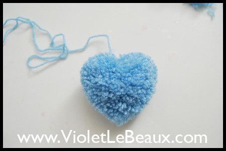 How To Make A Heart Shaped Pompom - Violet LeBeaux - Tales of an Ingenue Christmas Pom Pom Crafts, Heart Pom Pom, Pom Pom Tutorial, Yarn Crafts Crochet, St Patricks Crafts, Pom Pom Flowers, Diy Pom Poms, Diy Valentine's Day Decorations, Pom Pom Rug