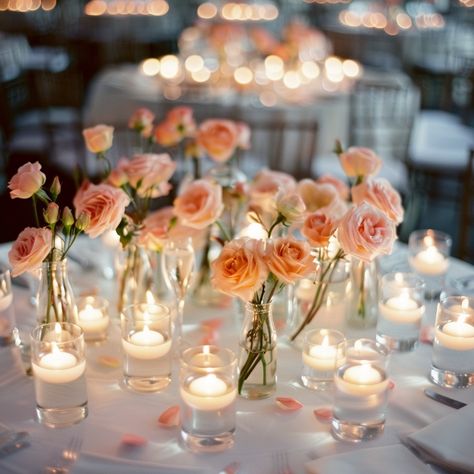 Ensure that your event flowers will continue to delight your guests long after the party is over. Imagine small, hand-tied bouquets elegantly placed on tables. These arrangements, initially set with flowers and candles, can be taken home by your guests. This thoughtful gesture not only reduces waste, but also adds beauty and happiness to your event. Please see the carousel for examples, Classic White Bouquets: These are pre-made, hand-tied bouquets placed in vases. Simple yet sophisticat... Single Flower And Candle Centerpiece, Individual Flowers In Vases Wedding, Single Stem Table Decor, Wedding Small Centerpieces, Wedding Bud Vases And Candles, Floating Candles And Bud Vases, Small Table Flower Arrangements, Simple Elegant Wedding Table Decor, Small Vase Flower Arrangements