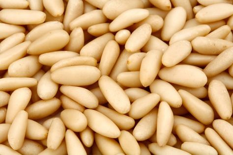 You might be surprised to find out where pine nuts actually come from—and how they're technically classified. The post What Is a Pine Nut, Exactly? appeared first on Reader's Digest. Pine Nut Tree, Pine Nut Recipes, Precision Nutrition, New York Pizza, Peanut Allergy, Pine Nut, Food Facts, Food Tips, Pine Nuts