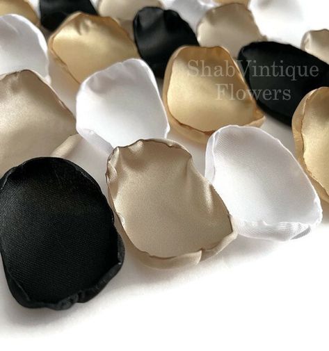 Black, Gold, Champagne, and White Flower Petals #black #gold #classywedding #Christmaswedding #reception #tabledecor https://t.co/1f0P7av9pU #weddingvibes #bohostyle #rusticwedding #weddingideas #partydecor #flowergirl #groomtobe #bridetobe2025 #weddings #bridalshower #weddingaisledecor #loveislove #flowers #weddingday #bridetobe2024 #groomtobe2025 Black Gold Cream White Wedding, Black Gold And Pearl Wedding, Wedding Champagne And Black, Wedding Color Schemes Black Champagne, Champagne Gold And Black Wedding, Champagne And Black Wedding, White Flower Petals, Gold Wedding Decorations, Wedding Aisle Decorations