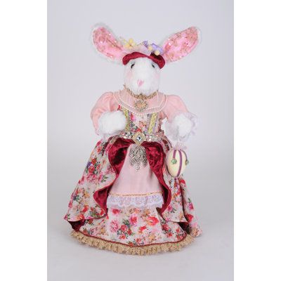 This is a heartwarming addition to your spring collection. With this collectible's soft-fluffy exterior, elaborate attire, handsomely molded shoes, and Victorian feel; she's chalked full of personality and will add character and style to any home. | Karen Didion Originals Royal Elegance Girl Bunny Fabric in Pink/Red, Size 19.0 H x 10.0 W x 8.0 D in | Wayfair Easter Figurine, Bunny Figurine, Bunny Designs, Spring Easter Decor, Stunning Outfits, Spring Inspiration, Novelty Print, Hand Designs, Spring Collection