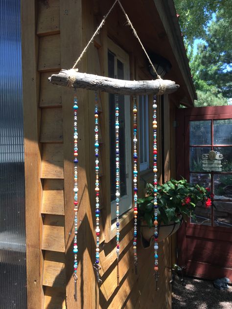 Old keys hung on a stick with beaded wire Stick With Beads Hanging, Stick Wind Chime, Wind Charm, Porch Leaners, Bored Board, Old Keys, Diy Wind Chimes, Daycare Crafts, On A Stick