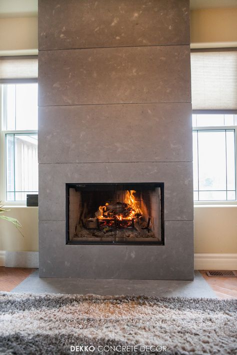 Engineered concrete panels around wood fireplace feature wall Concrete Panel Fireplace, Cement Board Fireplace, Concrete Tile Fireplace, Faux Cement Fireplace, Faux Concrete Fireplace, Interior Fireplace, Fireplace Feature, Fireplace Feature Wall, Cement Board