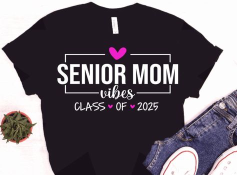 Senior mom 2025 shirt, Class of 2025, senior 2025 mom, proud mom 2025 senior, graduation, grad 2025 shirt, Senior year shirt design Additional images/shirts available here: https://www.etsy.com/shop/TXCraftyCouple Our shirts are made with high quality vinyl and pressed via a professional heat press. The printing process will allow you to wash and wear many times! These are unisex shirts- in my opinion they run like a normal t-shirt would run. For a looser fit, please order a size up. These shirts are super soft and comfy- you will find yourself wearing them every chance you can get!  Choose between a Bella + Canvas (soft feel) t-shirt OR Gildan 18000 Sweatshirt Senior Mom Shirt, Sr 25, Senior Games, Mom Vibes, Graduation Svg, Senior Shirts, Class Of 2025, Tea Shirt, Senior Graduation