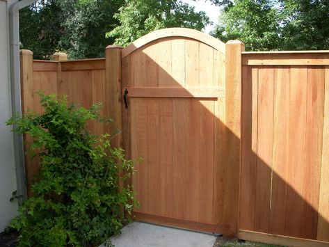 Solid, traditional wood fence w/ arched gate | aspenfence Decorative Fence Gate, Arch Fence Gate, Arched Fence Gate, Arched Wooden Gate, Arched Gate Fence, Wood Fences And Gates, Garden Gate Wood, Wood Fence With Gate, Fence With Arched Gate