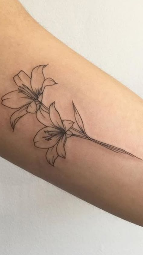 Flower Tattoos Feminine, Linework Lily Tattoo, Minimal Lily Flower Tattoo, Stargazer Lily Fine Line Tattoo, Tattoos Lily Flower, Flower Lilly Tattoo, Two Lillies Tattoo, Lily Tattoo Back Of Arm, Tattoos Of Lilies