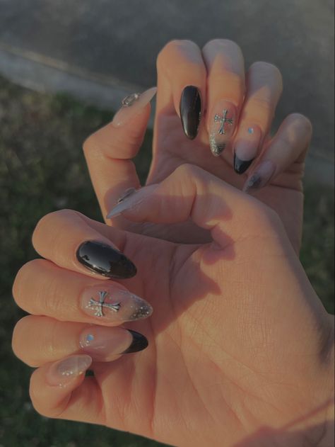 Black French Tip Nails With Gems Almond, Cute Almond Nails With Charms, Black French With Rhinestones, Black Almond French Tip With Gems, Simple Charm Nails, Almond Nails With Cross Charm, Black French Tips With Cross Charms, Black Nails W Charms, Black Nails With Silver Charms