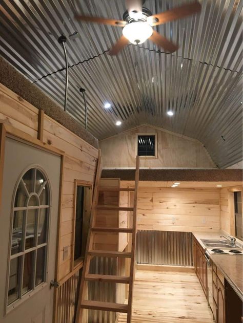 Looking as rustic on the outside as it does inside, this 30' tiny cabin house is an affordable living option. Rustic Tiny House Interior, Rustic Tiny House Cabin, Barn Tiny House, Lofted Barn Cabin, Small Cabin Interiors, Rustic Tiny House, Lake Property, Tiny House Interior Design, Cabin House