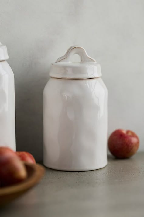 A pretty and practical addition to your kitchen counter, these lidded ceramic storage jars keep your essential dry ingredients close at hand. | Ceramic Storage Jar by Terrain, Size: Small at Anthropologie Ceramic Storage Containers, Storage Jar, Ceramic Flour Jar, Ceramic Office Accessories, Pottery Canisters, Flour Jars On Counter, Practical Pottery, Cannister Ideas Kitchen, Kitchen Canisters On Counter