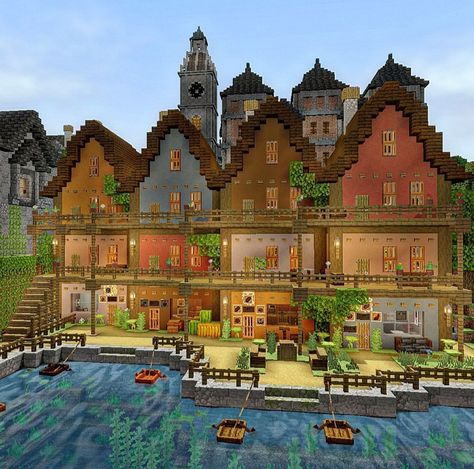 Cute Villager Houses Minecraft, Minecraft Howls Castle, Minecraft Swiss Village, Cute Minecraft Towns, Minecraft Village Ideas Buildings List, Minecraft Town Inspiration, Minecraft Costal Village, Minecraft Town Themes, Minecraft Group House