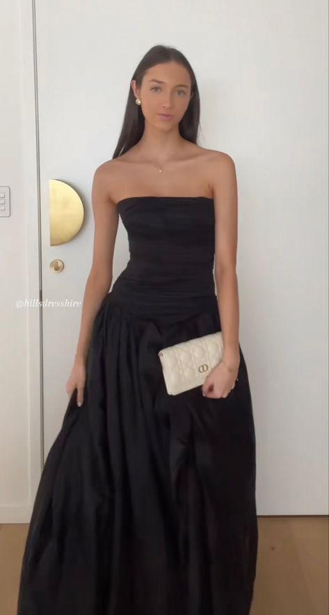 A black elegant dress paired with captivating statement earrings, elevating your style to new heights of chic. Classic meets bold for an unforgettable look. #fashion #style #blacktiewedding Strapless Black Formal Dress, Black Elegant Dress, Black Strapless Gown, Tie Styling, Strapless Dress Black, Strapless Black Dress, Formal Ideas, Prom Dress Inspo, Black Bridesmaid