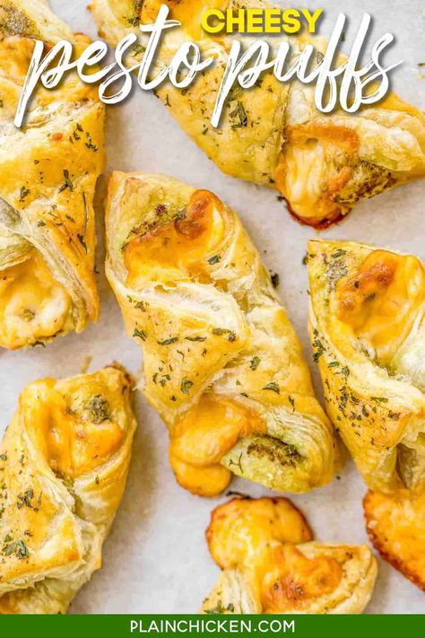 Cheesy Pesto Puffs - only 4 ingredients! Puff pastry, pesto, cheese, and egg wash. Great as an appetizer with warm pizza sauce or as a side to your meal. They only take a minute to make. You can assemble ahead of time and freeze for later. These things fly off the plate! Everyone LOVES this flavor combination!! #pesto #cheese #puffpastry #appetizer #sidedish #bread Pesto Puff Pastry, Puff Pastry Recipes Pesto, Pesto Tree Puff Pastry, Cheese Puffs Recipe Appetizers, Puff Pastry With Pesto And Cheese, Pesto Cheese, Quick And Easy Appetizers, Puff Pastry Sheets, Pastry Sheets