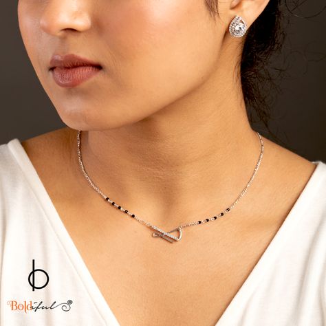 The sleek geometric lines curve into the infinity symbol that gracefully signifies the infinite love and deep connection you share with your partner. Shop now at www.boldiful.com . . . . . . #boldiful #minimalmangalsutra #boldifuljewellery #sterlingsilver #finejewelry #mangalsutra #modernmangalsutra #mangalsutradesigns #mangalsutram #mangalsutracollection #daintyjewelry #sterlingsilver #minimaljewellery #indianjewelleryusa #indianjewelleryuk #silverjewellery925 #mangalsutraonline #mangalsutra... Silver Mangalsutra Designs, Partner Drawing, Silver Mangalsutra, Infinity Pattern, Infinite Love, Mangalsutra Designs, Minimal Classic, Deep Connection, Infinity Symbol