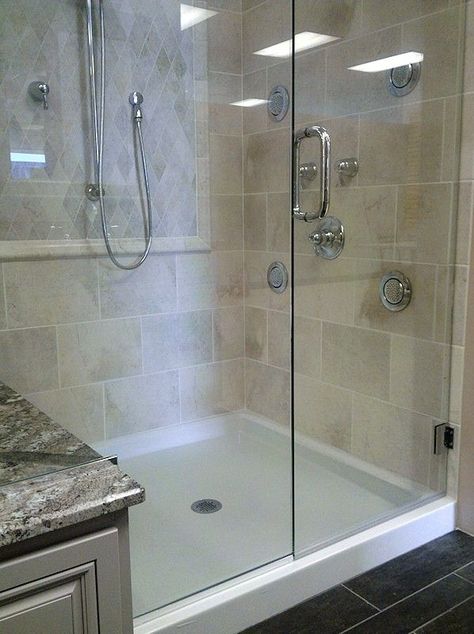 Here at Home Time Bathrooms, we offer a wide variety of materials to use in your bathroom remodel. Such as Tile, Acrylic, and Onyx. You can even combine materials to make your perfect shower, like this shower with a hinged glass door, ceramic tile walls, and an onyx shower pan base! Just call us to get a FREE Estimate! (480)-704-3327 Onyx Showers, Tile Shower Walls, Gorgeous Bathroom Tile, Onyx Shower, Shower Makeover, White Bathrooms, Box House, Dream Bath, Bathroom Remodel Ideas