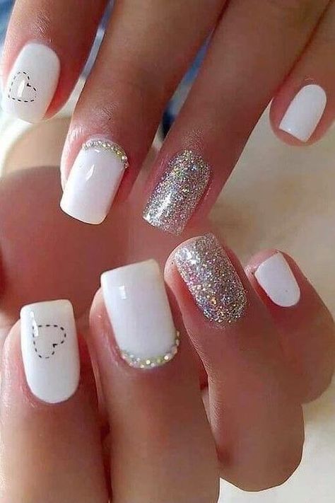 70 Cute Valentine's Day Nail Designs You Will Love 2023 Classy Nails Short Winter 2023, Gel Nails White Short, Gel White Nail Designs, Short White Valentines Nails, White Valentine’s Day Nails, Short White Gel Nails With Design, Cute Valentines Day Nails Acrylic Short, Heart Nails With Glitter, Valentines Day Nails Short Dip