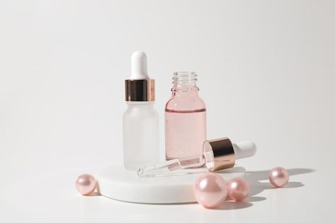 Two glass bottles of cosmetic liquid tra... | Premium Photo #Freepik #photo #essential #essential-oil #dropper #health-product Minimal Skincare, Turmeric Vitamins, Skin Aesthetics, Skin Care Product, Dropper Bottle, Pink Pearls, Cosmetic Design, Body Polish, Dropper Bottles