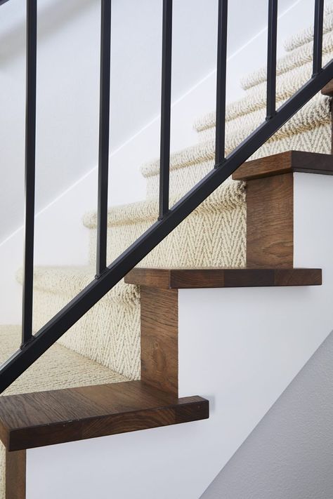 The stairway of this modern farmhouse was completely transformed with a herringbone runner and custom iron railing. The treads and risers were stained to match the new hickory floors by Jillian Lare Interior Design. Farmhouse Staircase Runner, Stairway Flooring, Stairways Design, First Floor Remodel, Stairway Makeover, Hickory Floors, Farmhouse Staircase, Farmhouse Stairs, Stairway Decorating