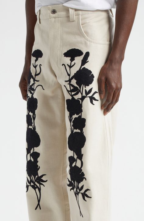 Shadowy floral embroidery blooming vertically up the thighs brings the Australian label's eclectic spirit to all-cotton jeans in a straight-leg silhouette. 31" inseam (size 48 EU) Zip fly with button closure Five-pocket style 100% cotton Dry clean Imported Designer Clothing