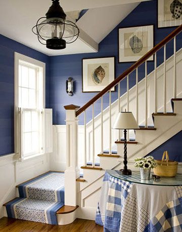 Deep blue with white wainscoting, light fixture.... Like a old lantern. Would prefer different table cloth Beach House Stairs, Blue And White Room, Navy Blue Paint Colors, Hal Decor, Stair Case, Blue Paint Colors, Coastal Living Rooms, House Stairs, White Room