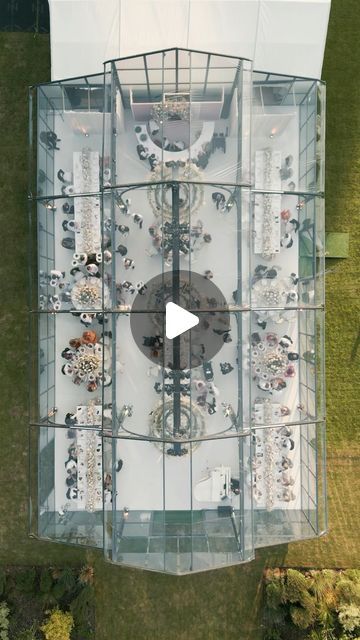 Kristina Kempton // Kristina Murphy on Instagram: "Dreaming Reimagined 💭 A sensational glasshouse Birds Eye view we created for our clients dream wedding. A floral fantasy dreamscape for the most special couple in the grounds of Grantley Hall. This quintessentially English wedding was nothing short of spectacular. Wedding Planner @kristina.kempton Videographer @tynegate_films Venue @grantleyhall_ Florist @larrywalshe Glasshouse @englishmarqueecompany Production @forta.productions Photographer @bottega53 Entertainment @lukeburr @kirk_jay Scent @jomalonelondon Bride @berta #grantleyhallwedding #grantleyhall #luxuryweddingplanner #kristinakempton #luxuryweddings #glasshouse" Greenhouse Venue, Event Venue Design, Glass House Wedding, Tent Wedding Reception, Event Venue Spaces, Inmobiliaria Ideas, Dream Wedding Reception, Clear Tent, Events Place