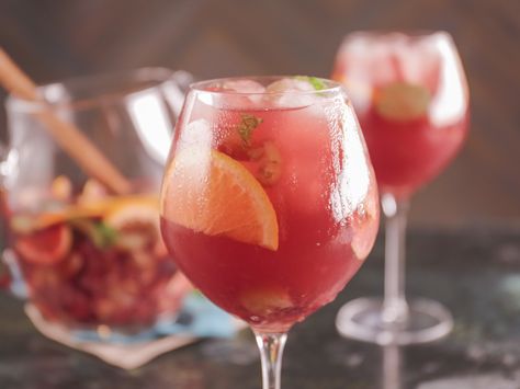 Get this all-star, easy-to-follow Fresh Grape Sangria recipe from Bobby Flay Bobby Flay Sangria, Grape Sangria, Bobby Flay Brunch, Sangria Drink, Bobby Flay Recipes, Fruity Wine, Frozen Grapes, Sangria Recipe, Breaking Bread