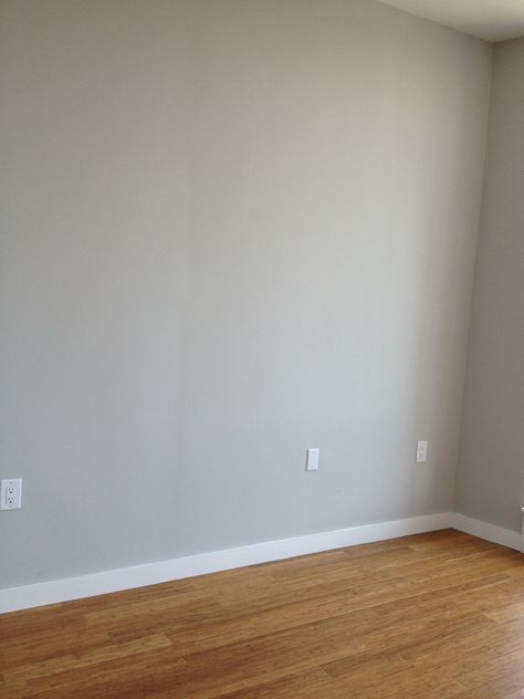 Master Bedroom: gray walls and oak floors Oak Floors Bedroom, Interior Grey Walls, Bedroom Gray Walls, Family Home Interior, Bedroom Wooden Floor, Basement Suite, Interior Paint Colors For Living Room, Bedroom Paint Colors Master, Bedroom Gray