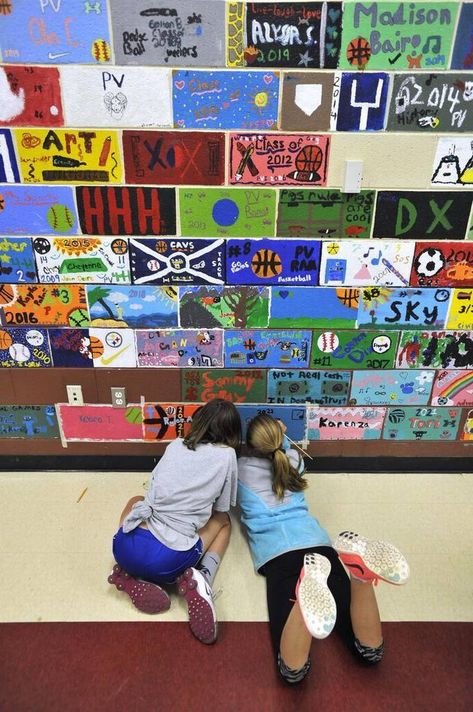 Rylee Arney, left, and Skylar Zettle paint their bricks on the wall May 20, 2015. Penns Valley Area Elementary School has a long standing tradition that sixth-grade students get to paint a brick in the cafeteria. The walls in the cafeteria are covered with colorful painted bricks from students over the years. Senior Brick Wall Painting Ideas, Bloomsburg University, Science Images, Drawing Now, Aerospace Engineering, Sixth Grade, Brick Design, Painted Brick, Boxer Dogs