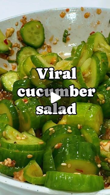 Lillia Harral - Online Personal Trainer / Wellness Coach on Instagram: "Save this one for later!  This viral cucumber salad is actually pretty easy to make.  If you love healthy, tasty, & easy recipes + and join the community in bio.  Don’t get hung up on the cucumber cuts, it’s not that serious.   👇Dressing  •Minced garlic    •2Tbsp rice vinegar  •2Tbsp Ponzo •1Tbsp Sesame Oil •Chili crunch -A LOT •Green onions •Sesame seeds  Don’t not skip salting the cucumbers! It totally changes the texture! 🥒  Follow along for more low calorie, in season, delicious & easy meals.   #healthysnacks #cucumbersalad #easyrecipes #lowcaloriemeals #quickmeals" Cucumber Chili Crunch, Build Your Cucumber Salad, Logan’s Viral Cucumber Salad, Cucumber Salad Italian Dressing, Chili Crunch Cucumber Salad, Tic Tok Cucumber Salad, Sliced Cucumber Recipes, Viral Cucumber Snack, Low Calorie Cucumber Salad