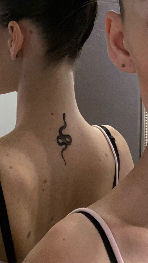 #tattoo #snake #snaketattoo #necktattoo #smalltattoo #cutetattoo #tattooideas #blacktattoo #animaltattoo Neck Tattoo Snake, Snake Tattoo Aesthetic, Snake Neck Tattoo Women, Snake Neck Tattoo, Neck Tattoo Women, Snake Tattoo, Foot Tattoo, Neck Tattoo, Black Tattoos