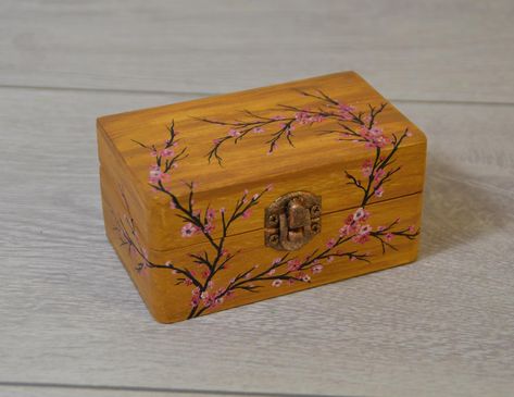 Hand painted wooden box with sakura flowers,Spring flowers,Jewellery flower box,Trinket box,Storage box,Floral hand painted box. A hand painted wooden jewelery box. This is really exclusive original, hand painted, hinged box. This box could be a good idea for gift.  The artwork is fantastic it would make an ideal jewelery or trinket box or somewhere to put your keys or bits and bobs that don't have a proper home. Whole box is painted several times by water varnish (easy to clean) The box measure Mini Box Painting Ideas, Diy Keepsake Box Ideas Wood, Jewellery Box Painting Ideas, Painted Jewellery Box Ideas, Wood Jewelry Box Painting Ideas, Painting Wooden Boxes Ideas, Trinket Box Painting Ideas, Wooden Box Painting Ideas Easy, Painted Box Ideas