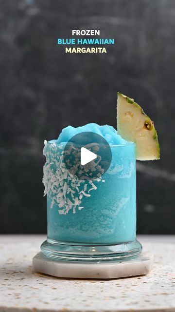 Everyday Cocktail on Instagram: "What is summer without frozen drinks? 🌞 This is the Frozen Blue Hawaiian Margarita! It’s an absolutely delicious and beautiful cocktail! 🍹

Recipe:

	•	1 cup ice ❄️
	•	2 oz tequila 🌵
	•	1/2 oz triple sec 🍊
	•	1/2 oz cream of coconut 🥥
	•	1 oz lime juice 🍋
	•	1.5 oz blue curaçao 🌊
	•	2 oz pineapple juice 🍍

#alcohol #bar #bartender #bartenderlife #cocktailrecipe #cheers #malibu  #bluehawaii
#coconut #creamofcoconut #beach #pineapple #freshdrink #pineappledrink #bluemargarita  #margarita #cincodemayo" Hawaiian Margarita, Blue Margarita, Cream Of Coconut, Frozen Blue, Alcohol Bar, Pineapple Drinks, Fresh Drinks, Patrick Stump, Boozy Drinks