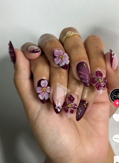 Plum Nail Designs, Purple Hibiscus Flower Nails, Purple Gel X Nails, Purple And Red Nails, Orchid Purple Nails, Purple Flower Nails, Purple 3d Flower Acrylic Nails, Y2k Floral Nails, 3d Orchid Nail Art