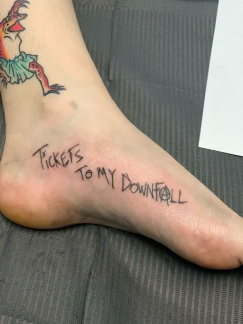 Machine gun kellys tickets to my downfall foot tattoo Tickets To My Downfall Tattoo, Mgk Tattoos Ideas Lyrics, Mgk Inspired Tattoos, Mgk Tattoos Ideas, Lyrics Tattoos, Mgk Tattoos, Mgk Aesthetic, Tickets To My Downfall, Foot Tattoo Quotes