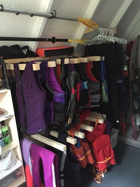 Life Jacket Storage Ideas, Jacket Storage Ideas, Life Jacket Rack, Life Jacket Storage, Jacket Storage, Dock Ideas, Kayak Storage Rack, Outdoor Organization, Boat Shed