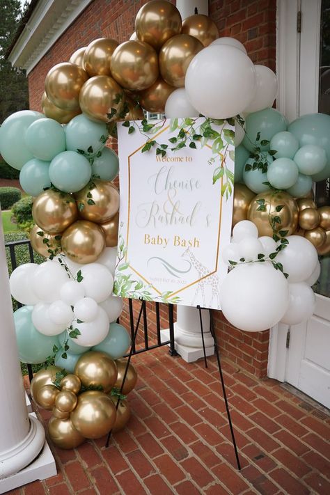 Safari-inspired #babybash with mint green, gold and white color scheme. With ceiling balloon install. #babyshower #balloongarland Mint Green And Gold Wedding Theme, Mint Green Balloons Decor, Wedding Decorations Mint Green, Mint Green And Gold Birthday Party Decor, Mint Green Decorations Party, Aka Balloon Decor, Mint Green Baby Shower Ideas, Mint Theme Party, Mint Green Birthday Decorations