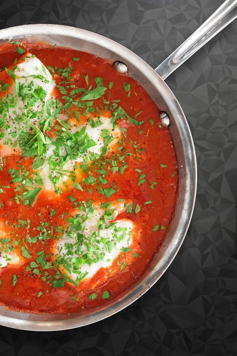 This Whole30-friendly Poached Cod in Tomato Sauce is so simple and delicious! You can get it on the table in just a few minutes on a busy weeknight! Fish With Marinara Sauce, Cod With Marinara Sauce, Cod In Tomato Sauce, Paleo Lasagna, Poached Cod, Poached Fish, Paleo Fish, Nom Nom Paleo, Sauteed Zucchini