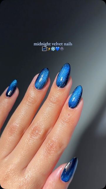 Kristin Kuyper 🤍 on Instagram: "🌌🌌🌌 • @gelcare.official  Patent Leather Black Midnight Velvet Sapphire  • • • #nails #almondnails #bluenails #winternails #gelnails #naturalnails #gelcare #nailinspo #nailtutorials" Navy Cateye Nail, Midnight Nails Taylor Swift, Blue Velvet Nails, Blue Cateye Nails, Navy Chrome Nails, Dark Blue Chrome Nails, Sapphire Blue Nails, Midnight Nails, Blue Cat Eye Nails