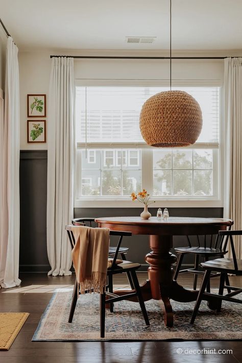 breakfast nook with chair rail, white drapes and a rattan chandelier Breakfast Nook Decor, Rattan Chandelier, Round Kitchen Table, White Drapes, Round Kitchen, Diy Craft Ideas, Elegant Curtains, Kitchen Nook, Chair Rail