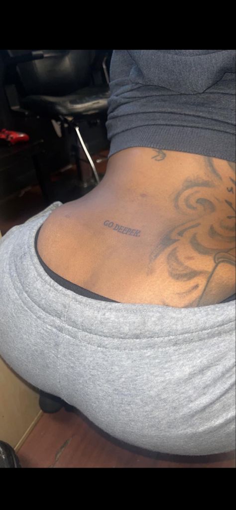 Go Deeper Tattoo On Back, Tramp Stamp Tattoos Black Women, Tramp Stamp Tattoos Words, Cute Shoulder Tattoos, Lower Back Tattoo, Deep Tattoo, Tramp Stamp Tattoos, Tato Minimal, Black Girls With Tattoos