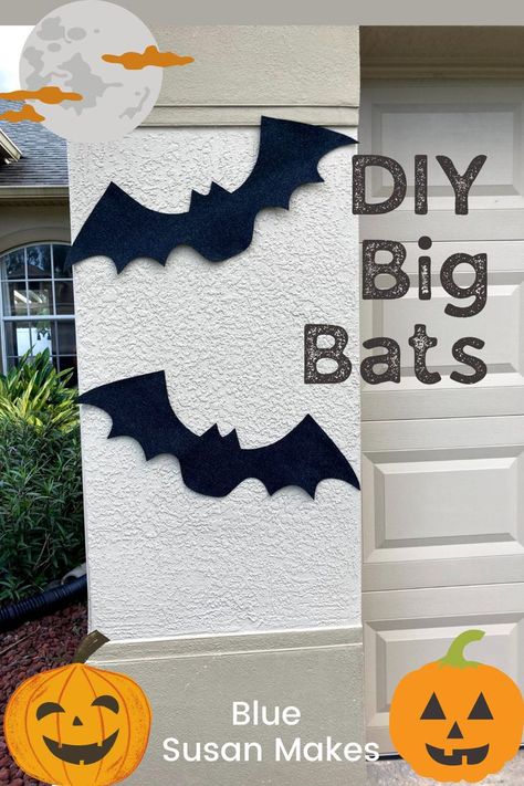 Large bat shapes decorate the garage for Halloween Outdoor Bats Diy, Halloween Bat Decorations Outdoor, Homemade Bats Halloween, Homemade Bat Decoration, Diy Halloween Bats Outdoor, Outdoor Bats Halloween, Diy Bats Halloween, Bat Diy Decoration, Diy Bats Decoration